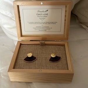 Never worn “Crazy Love” gold plated peacock feathers earrings.